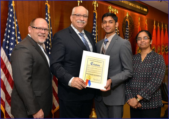 Nassau County Legislator Dennis Dunne, Sr. recently honored Pavithran Ravindran of W.T. 
